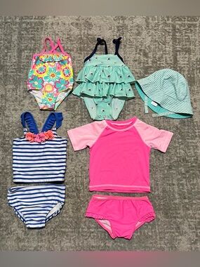 🔥4/20! Bundle of 4 baby girls swim suits & sun hat. Sizes 0-3M through 9-12M.